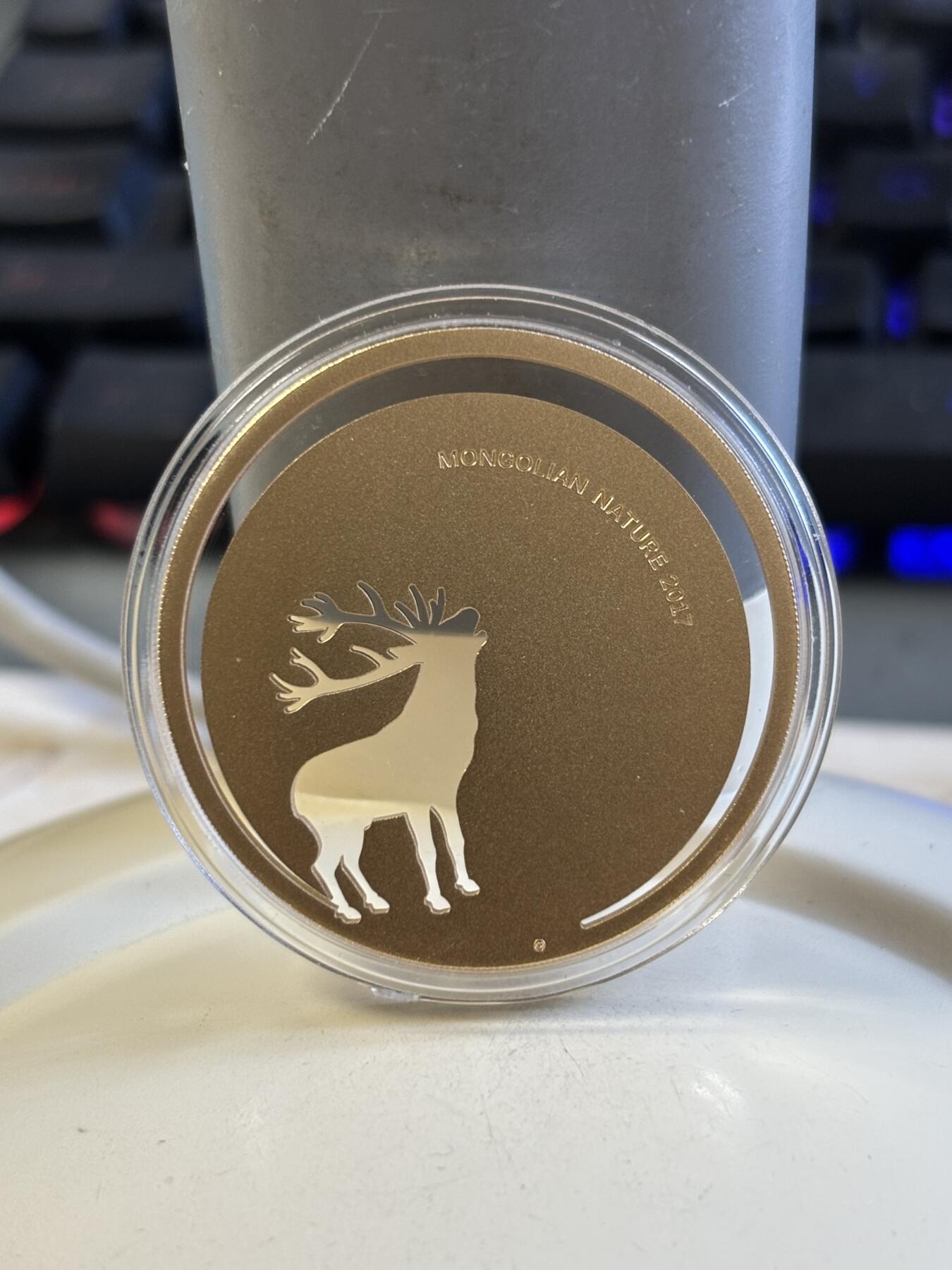 第183期拍卖 蒙古2017年自然系列雄鹿激光切割镂空镀金纪念银币，925银，发行2500枚