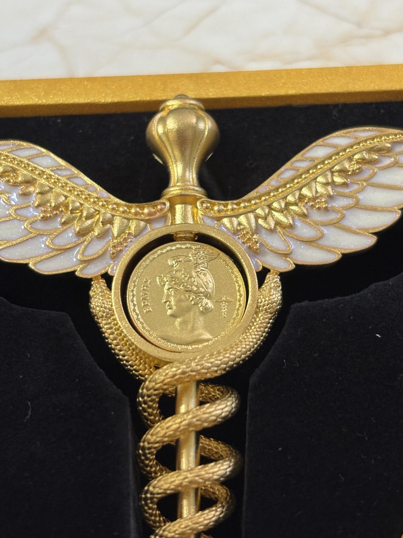 第183期拍卖 萨摩亚2025年墨丘利双蛇权杖2盎司银币中间可翻转，999银，发行699枚，2盎司