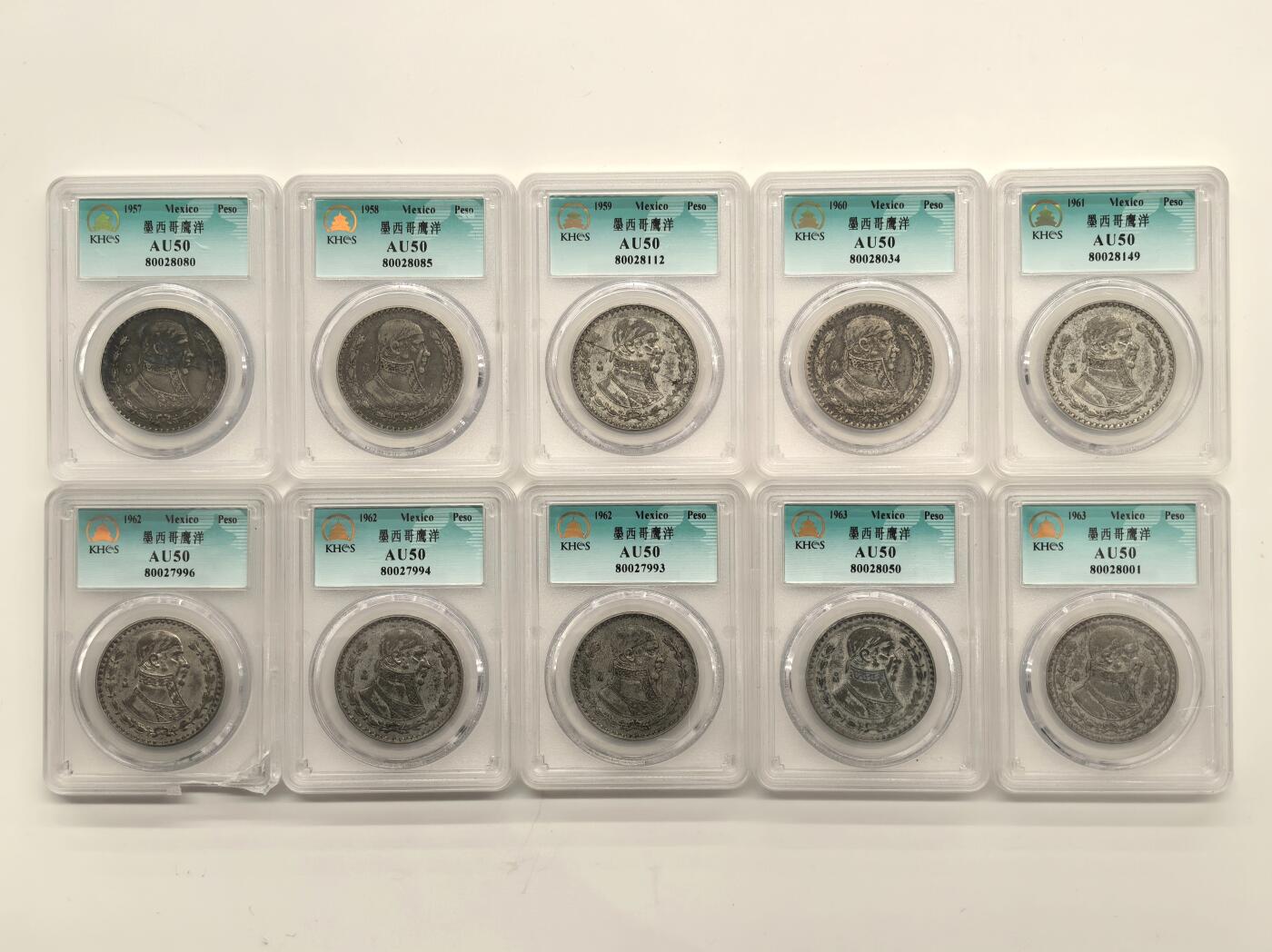 博洋堂世界钱币拍卖第149期（全场包邮） KHCS AU50 墨西哥1957-1963年1比索银币10枚一组，一枚盒子有缺损