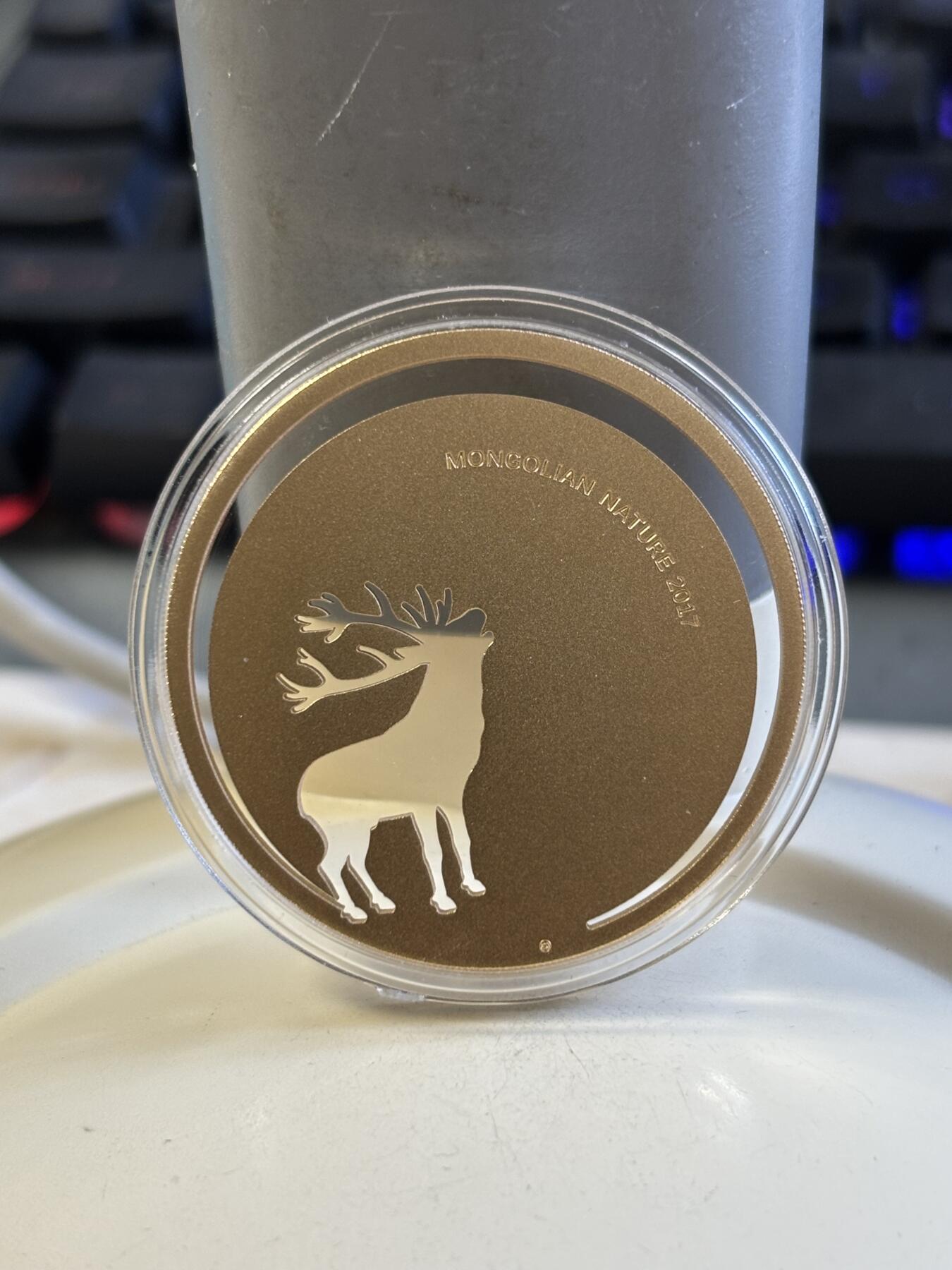 第183期拍卖 蒙古2017年自然系列雄鹿激光切割镂空镀金纪念银币，925银，发行2500枚