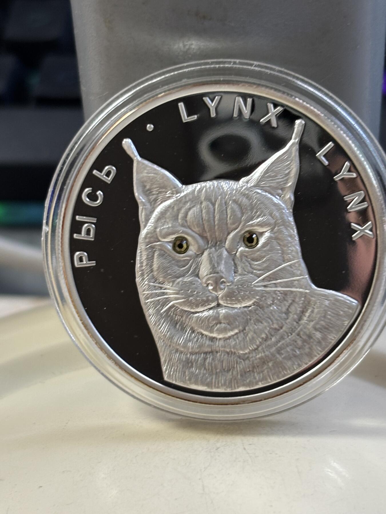 第183期拍卖 白俄罗斯2008年野生动物猞猁镶嵌黄水晶1盎司纪念银币，999银，发行8000枚