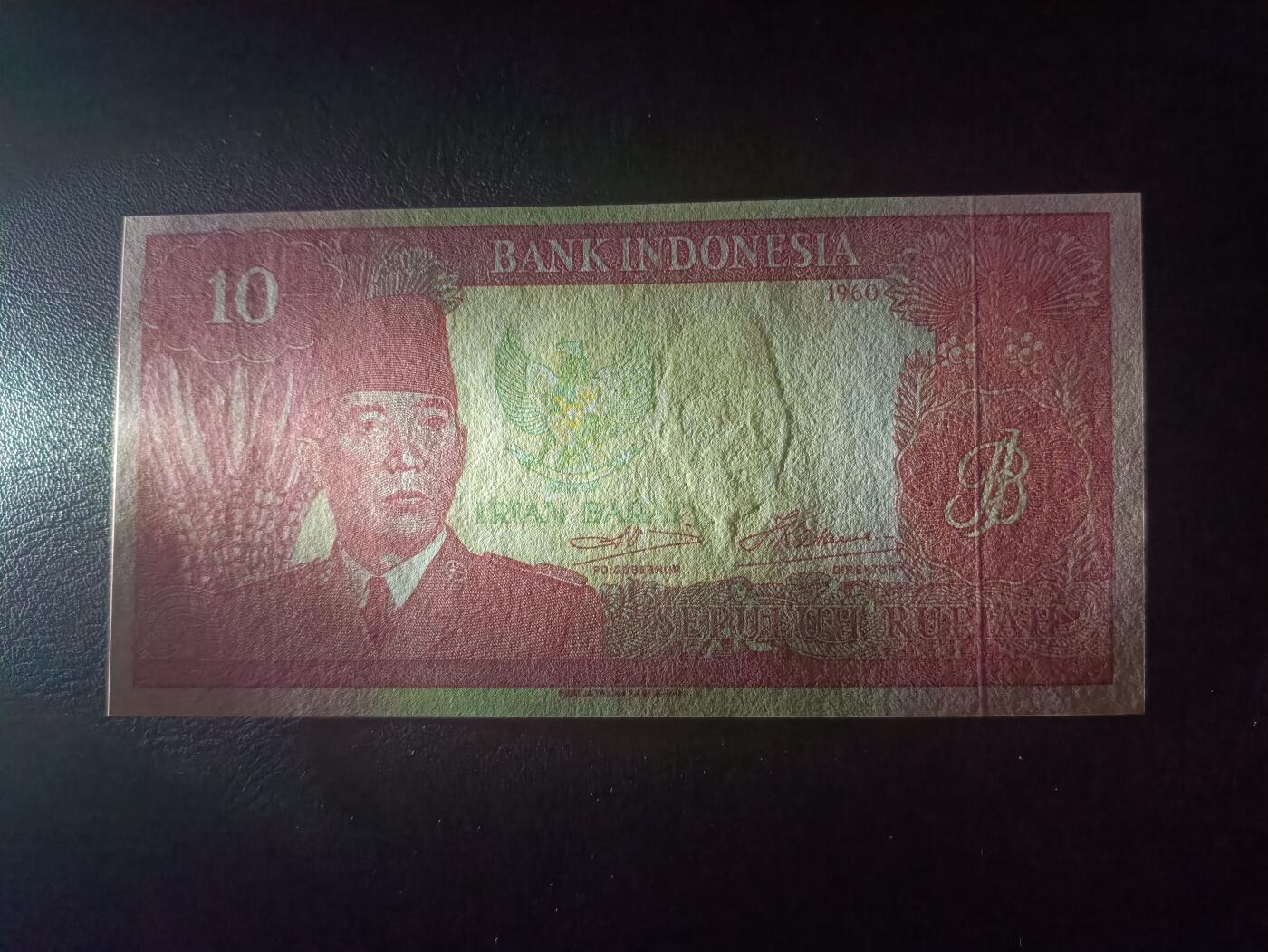 2025十一月第七期，总205期 印度尼西亚1960版10卢比流通好品XF，加盖“伊利安州”地名，建国后很长时间廖内和伊利安地区仍拥有自己的独立发钞权，1971年收归中央，非常稀有品种