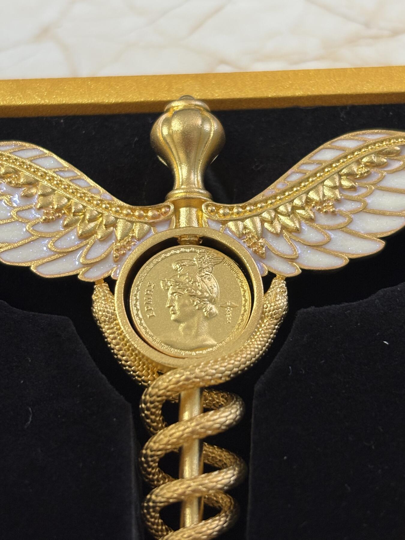 第183期拍卖 萨摩亚2025年墨丘利双蛇权杖2盎司银币中间可翻转，999银，发行699枚，2盎司