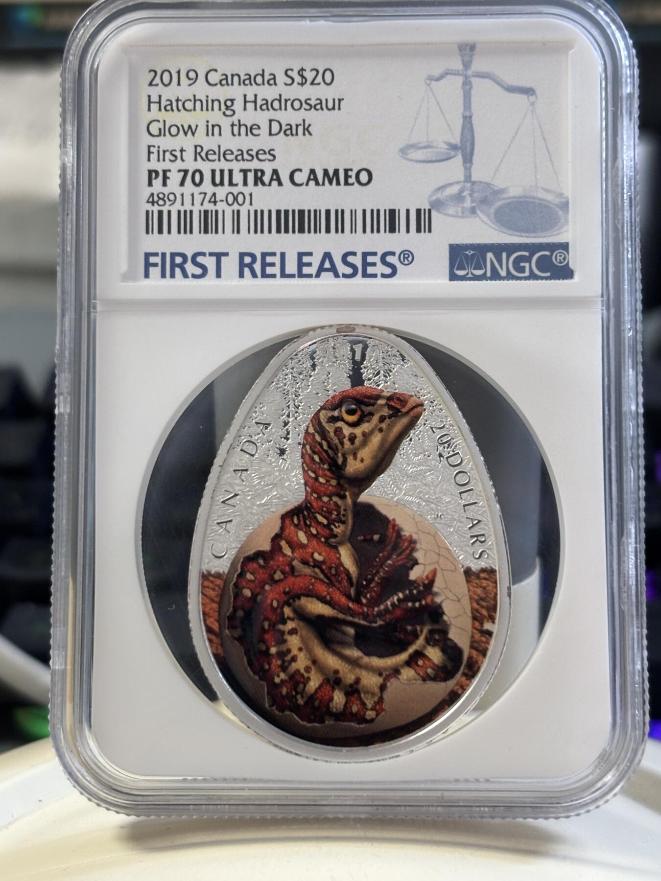 第183期拍卖 加拿大2019年孵化的鸭嘴龙荧光纪念银币NGC-PF70首无盒无证书，9999银，31.82克，发行4000枚