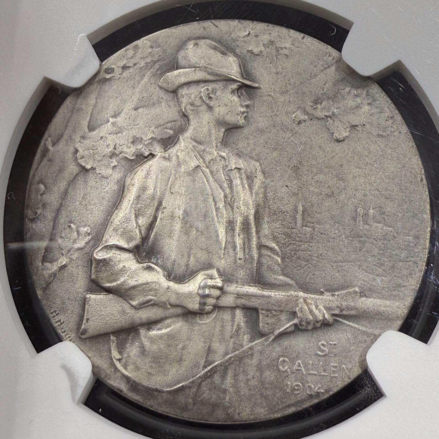 「木头集藏」章牌精品专场！ 1904年瑞士圣加仑射击节银章，NGC UNC，直径：33 mm，品相不错。
