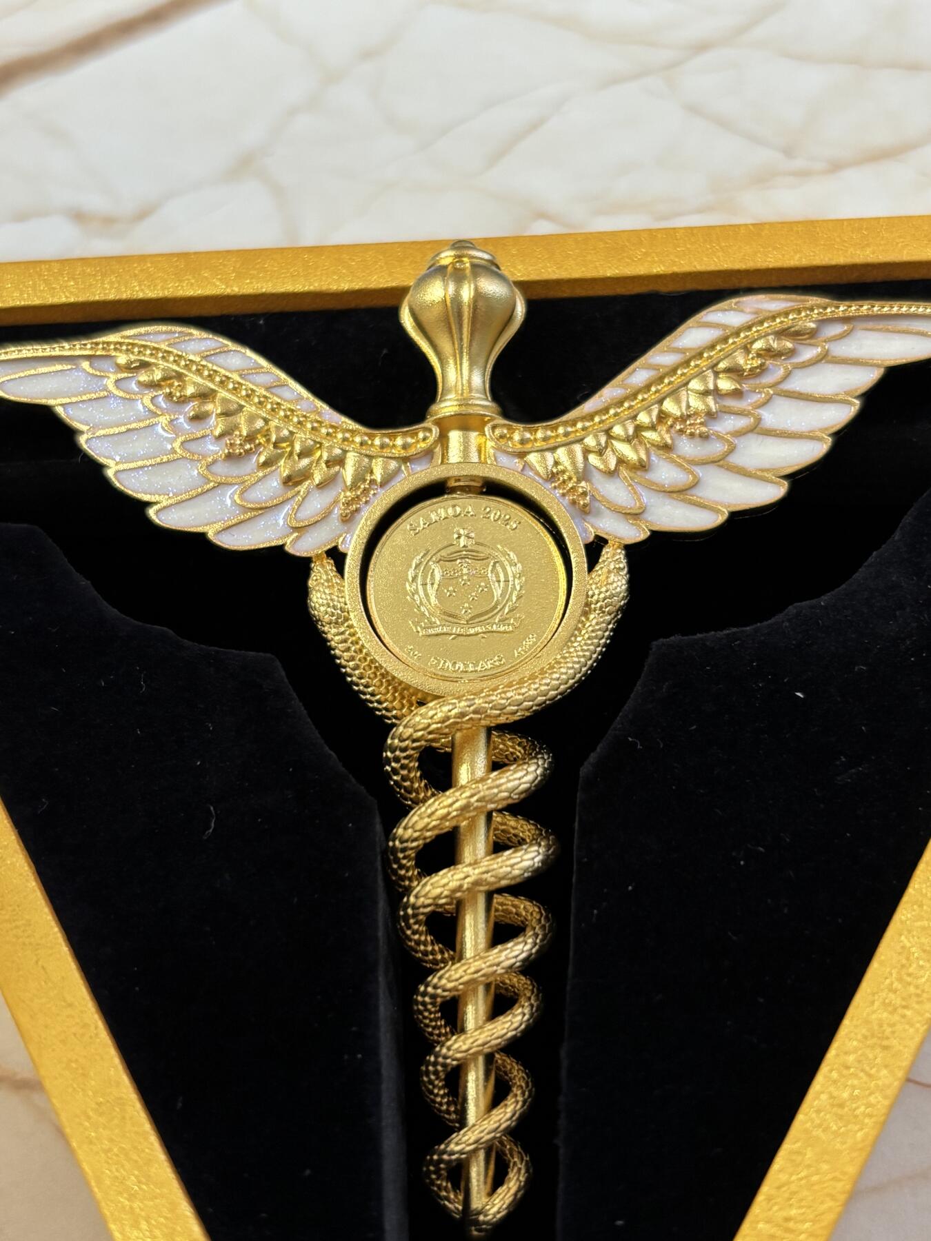 第183期拍卖 萨摩亚2025年墨丘利双蛇权杖2盎司银币中间可翻转，999银，发行699枚，2盎司