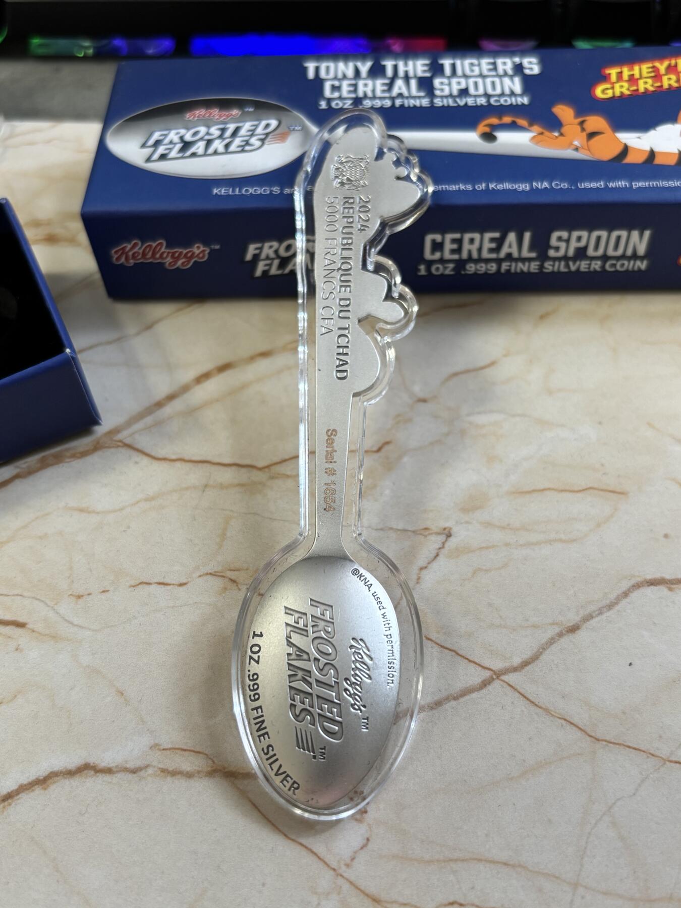 第183期拍卖 乍得2024年Kellogg吉祥物老虎托尼勺子形纪念银币，999银，1盎司，有掉色