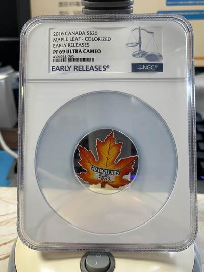 第183期拍卖 - 加拿大2016年世界首枚全彩色枫叶形1盎司纪念银币NGC-PF69无盒无证书，9999银，发行15000枚