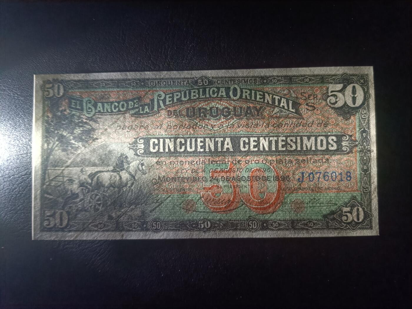 2025十一月第七期，总205期 乌拉圭共和国东方银行1896年50分UNC，19世纪中后期地方银行品种，双马套车和国徽，稀有品种