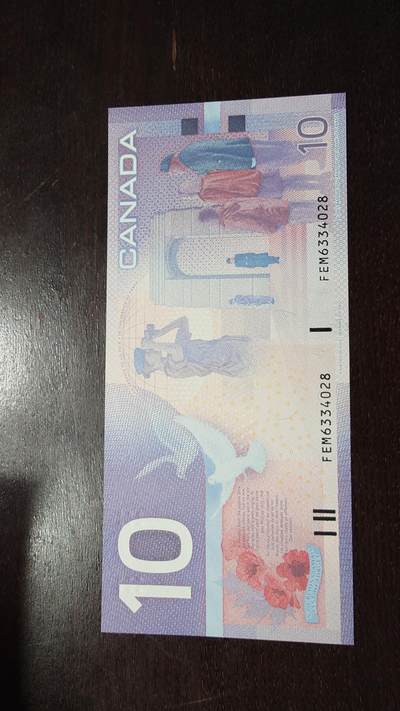 世界钱币～微拍第217期暨2025年第57期  近日新到货品少量 以及老库存一些 - 2002年加拿大10元 旅版初版无金属线 全新绝品尾号028