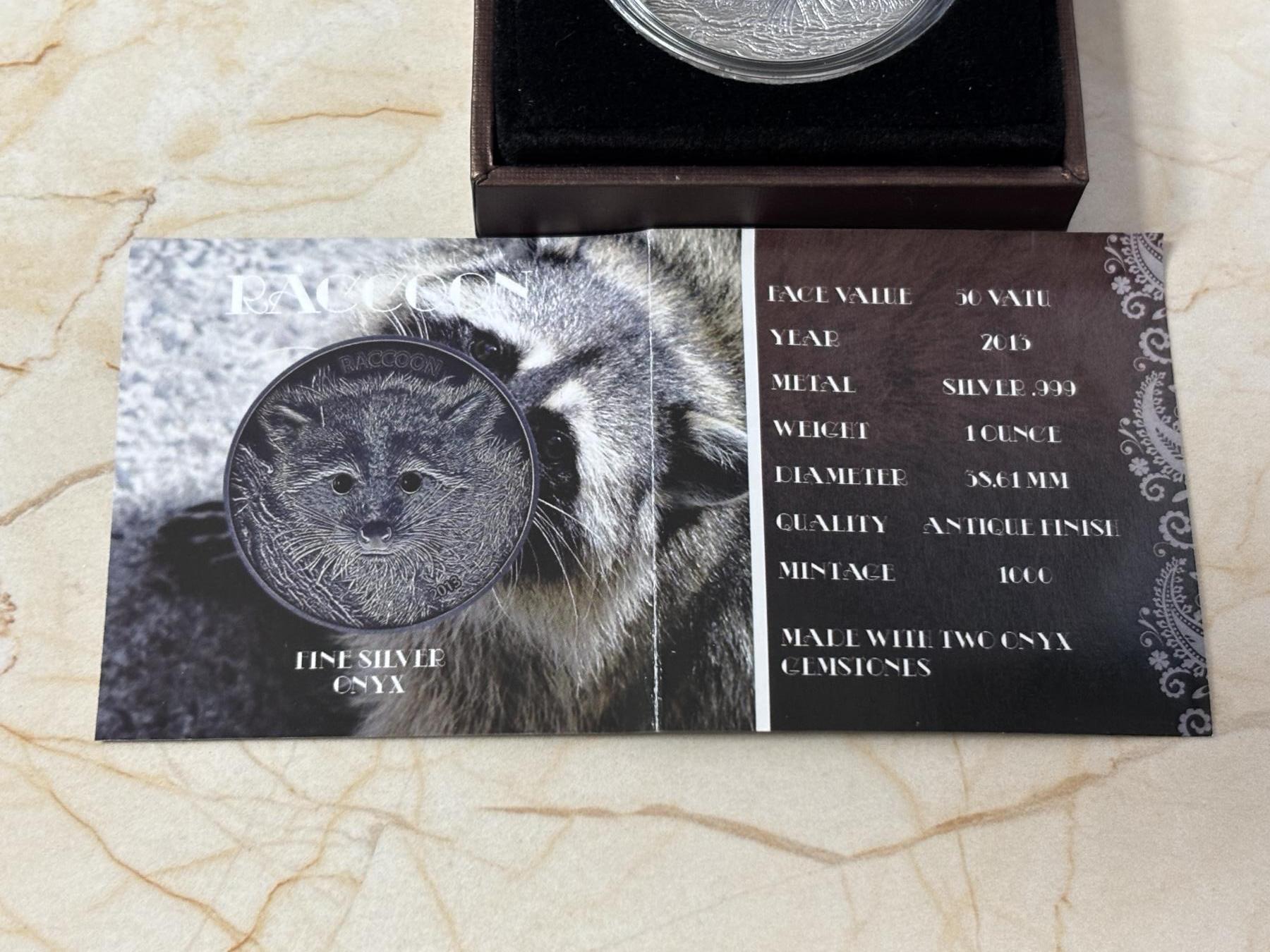 第183期拍卖 瓦努阿图2013年小浣熊镶天然黑钻石1盎司纪念银币，999银，发行1500枚