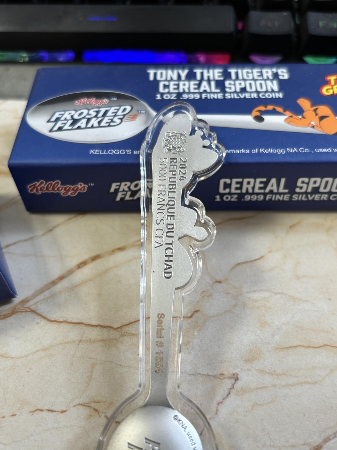 第183期拍卖 乍得2024年Kellogg吉祥物老虎托尼勺子形纪念银币，999银，1盎司，有掉色