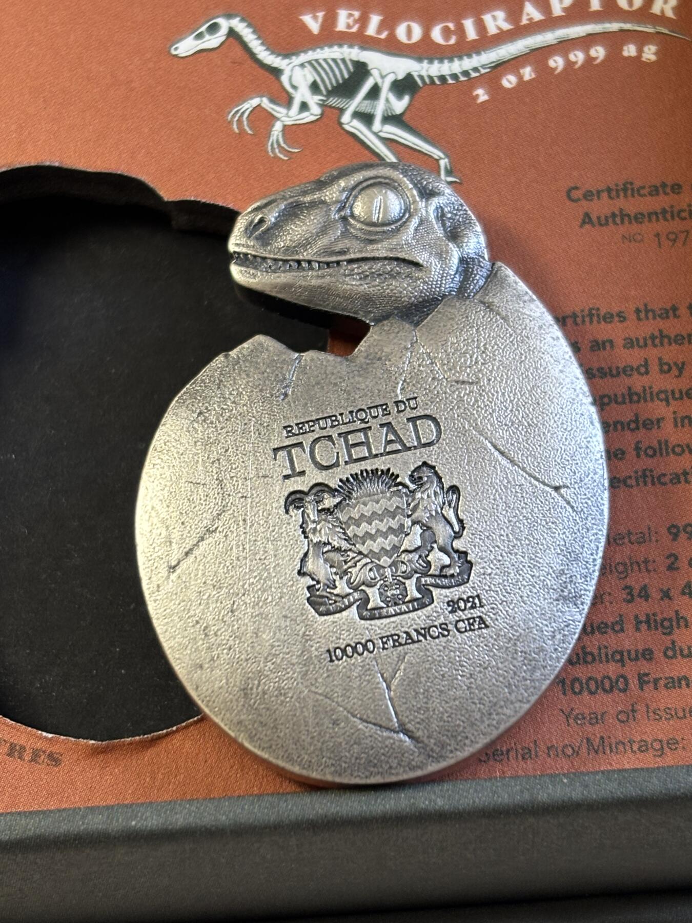 第183期拍卖 乍得2021年迅猛龙诞生2盎司高浮雕仿古异形银币，2盎司，999银，发行500枚