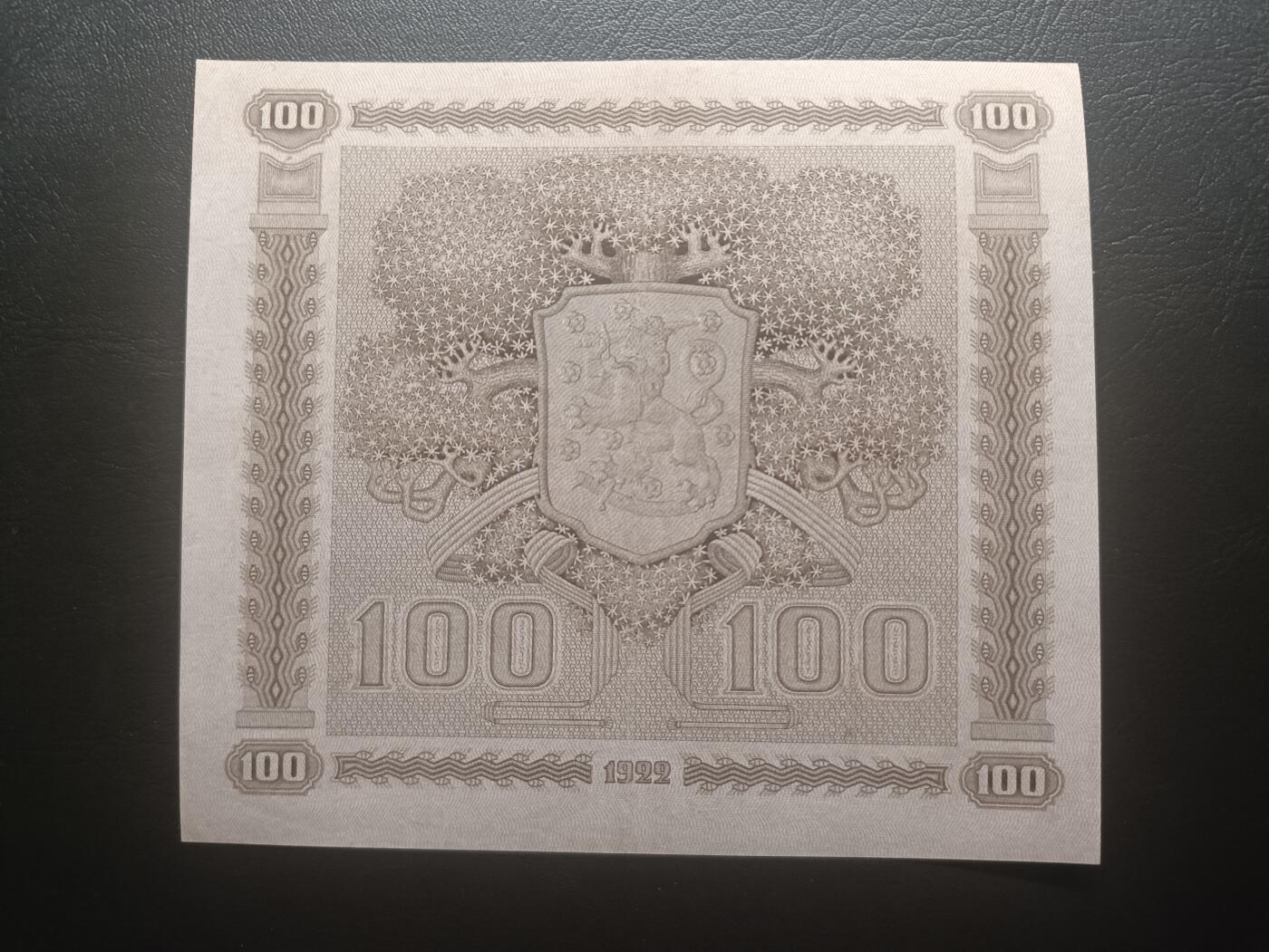 2025十一月第七期，总205期 芬兰1922年100马克AUNC，此系列稀有的首年份首序列A，象征着民族的起源和前进的意境画和国徽