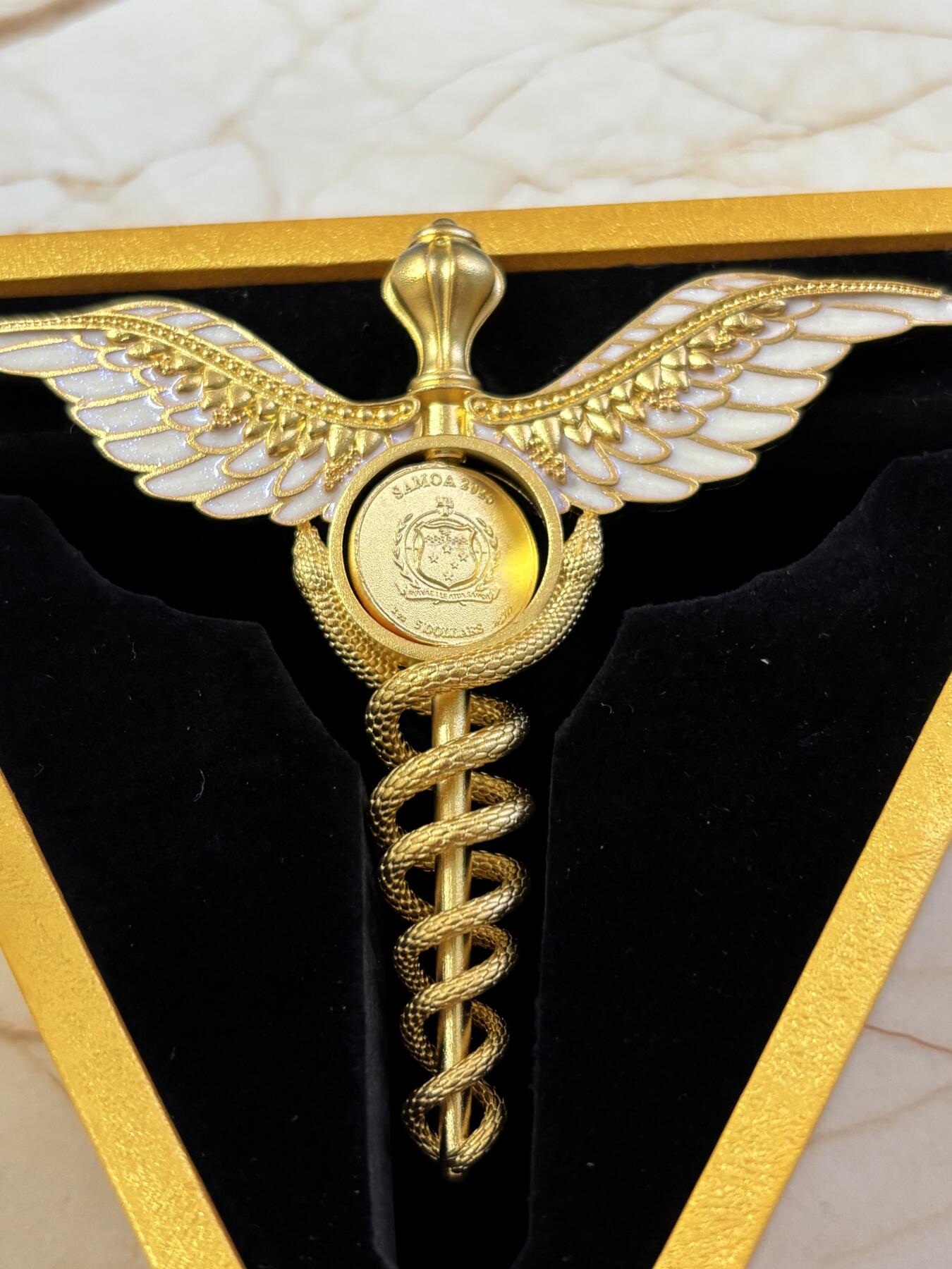 第183期拍卖 萨摩亚2025年墨丘利双蛇权杖2盎司银币中间可翻转，999银，发行699枚，2盎司