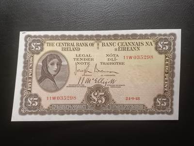 2025十一月第七期，总205期 - 爱尔兰1948年5镑AUNC角有洞无47，早期下方有英爱两国货币互换协议的版本，爱尔兰人格化象征“拉维利夫人”