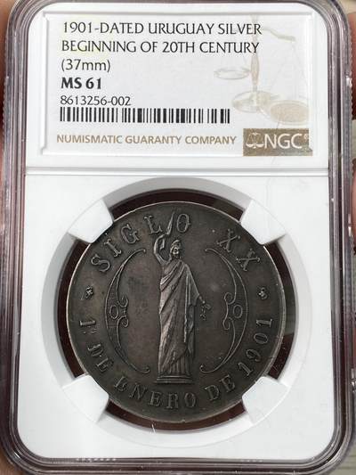 万国钱币拍卖第056期 - NGC MS61 1901年乌拉圭共和国迎接新世纪纪念银章 南美女神罕见 黑包浆乌拉圭盾徽配花体字非常漂亮首见品种