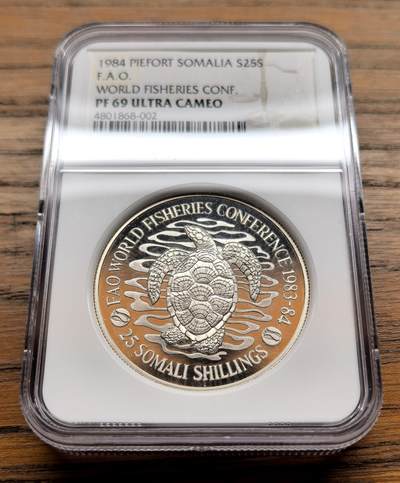 纫秋兰以为佩·凡希社微拍感恩专场 - 1984索马里FAO渔业会议25S大银加厚版NGC-PF69UC