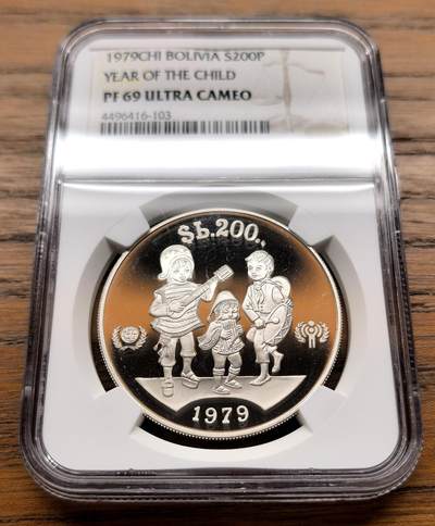 纫秋兰以为佩·凡希社微拍感恩专场 - 1979玻利维亚儿童年200P大银NGC-PF69UC