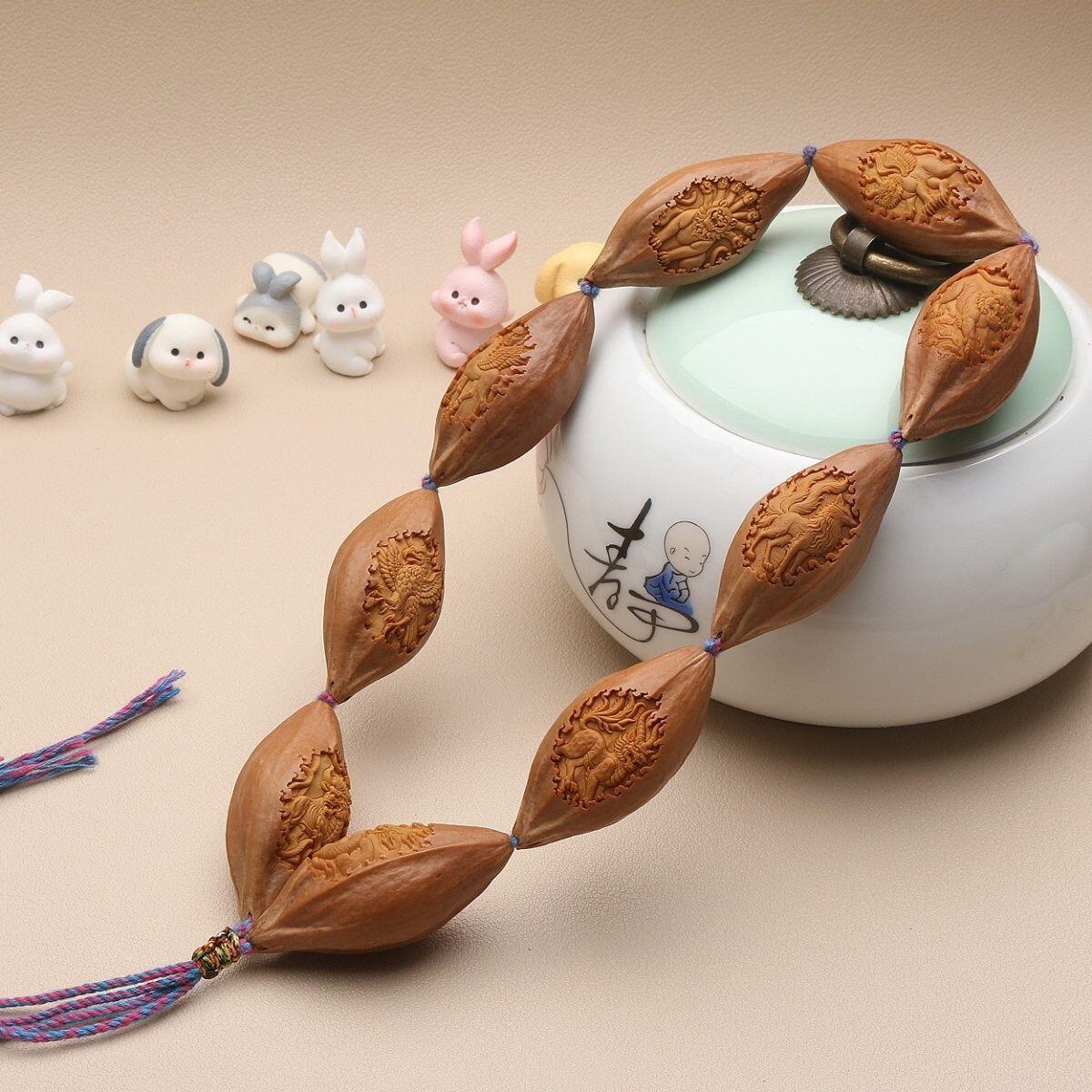 听雨轩（31） 山海经橄榄核手工雕刻 文玩核雕手串