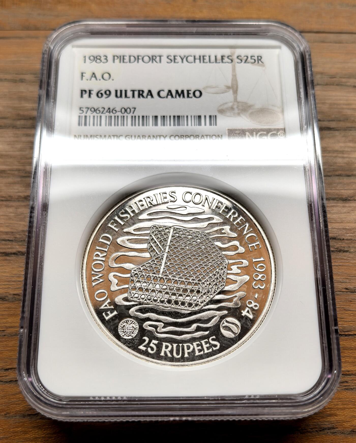 纫秋兰以为佩·凡希社微拍感恩专场 1983塞舌尔FAO渔业会议25卢比大银加厚版NGC-PF69UC
