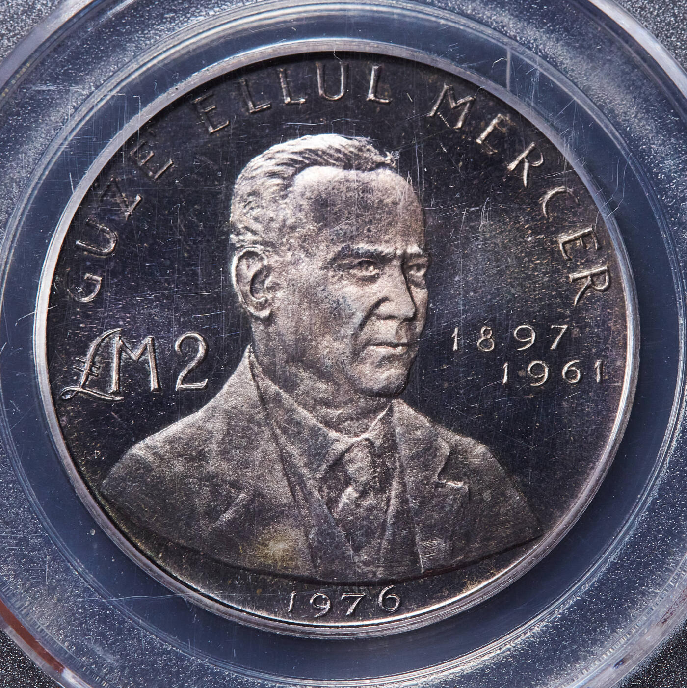 【俄甄集藏】2025年(045)12-03 星期三 晚 19:30 全场包邮 马耳他1976年历史人物系列-众议员、作家、记者格泽·埃卢尔·默瑟2镑纪念银币，公博 MS63，类精制底板，重：10克，含银量：98.7%，发行量：11000枚，经典品种，评级盒面有裂