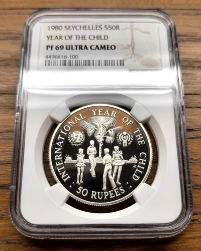 纫秋兰以为佩·凡希社微拍感恩专场 - 1980塞舌尔儿童年50R大银NGC-PF69UC