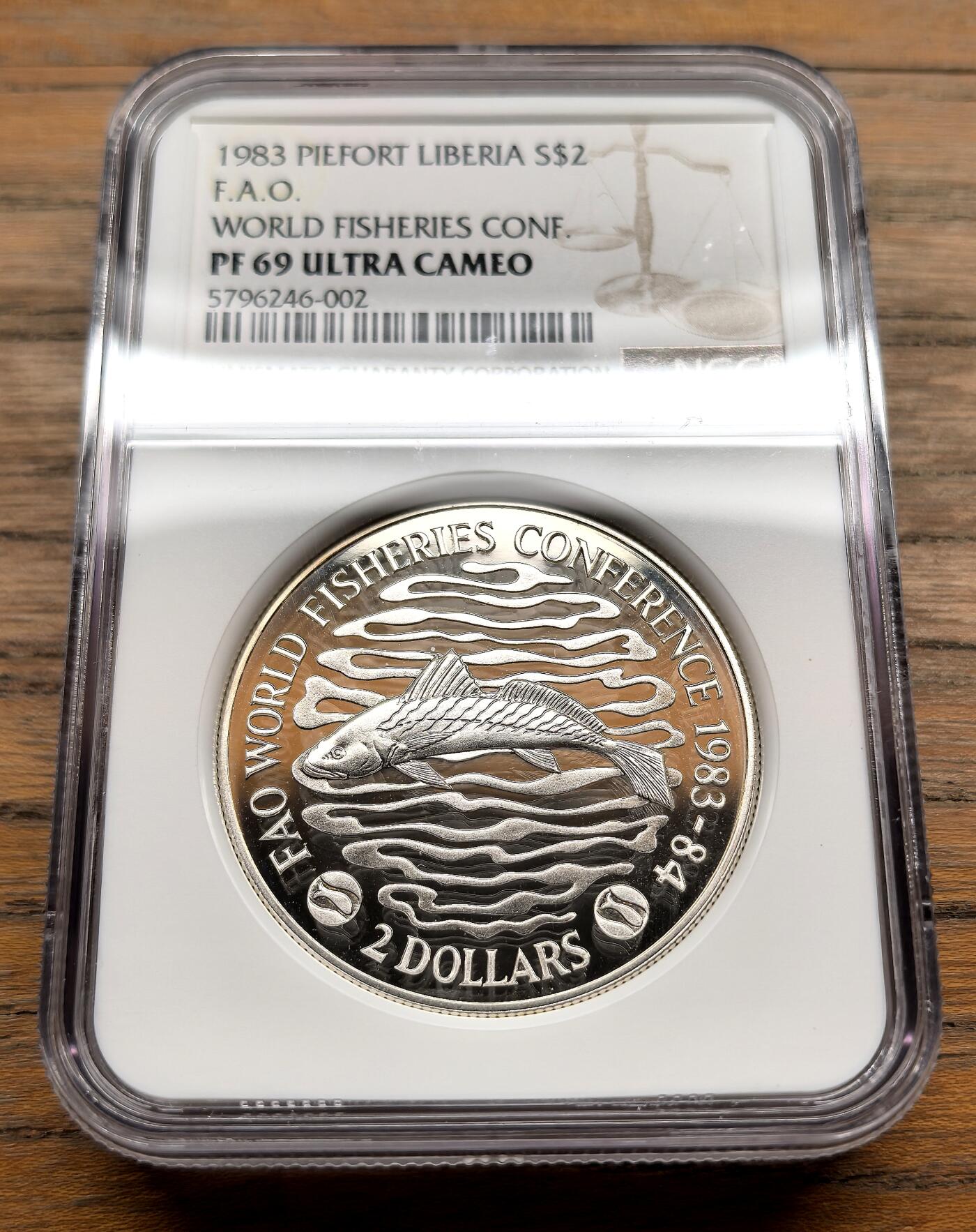 纫秋兰以为佩·凡希社微拍感恩专场 1983利比里亚FAO渔业会议2DOLLAR大银加厚版NGC-PF69UC