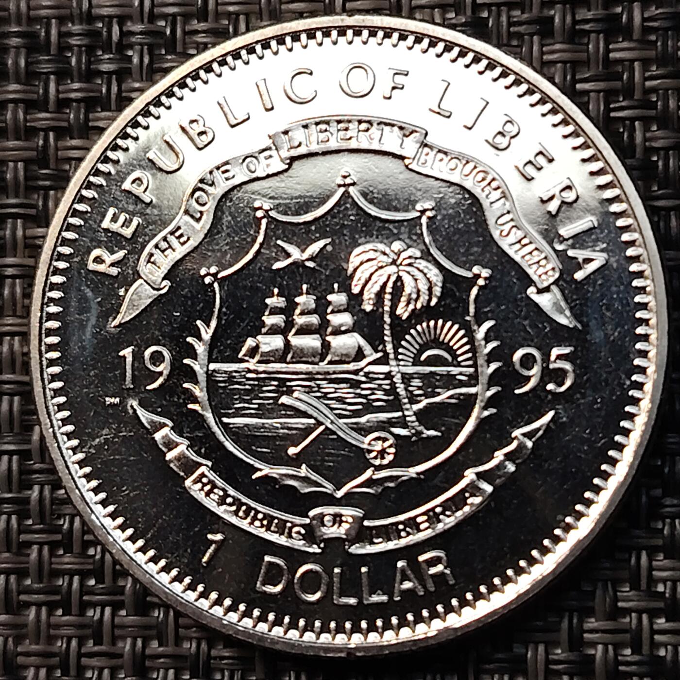 布加迪🐬～世界钱币(上海)🌾第 262 期 /  各国套币和散币 利比里亚🇱🇷 1995 1元 手拉手联合国成立50周年纪念币