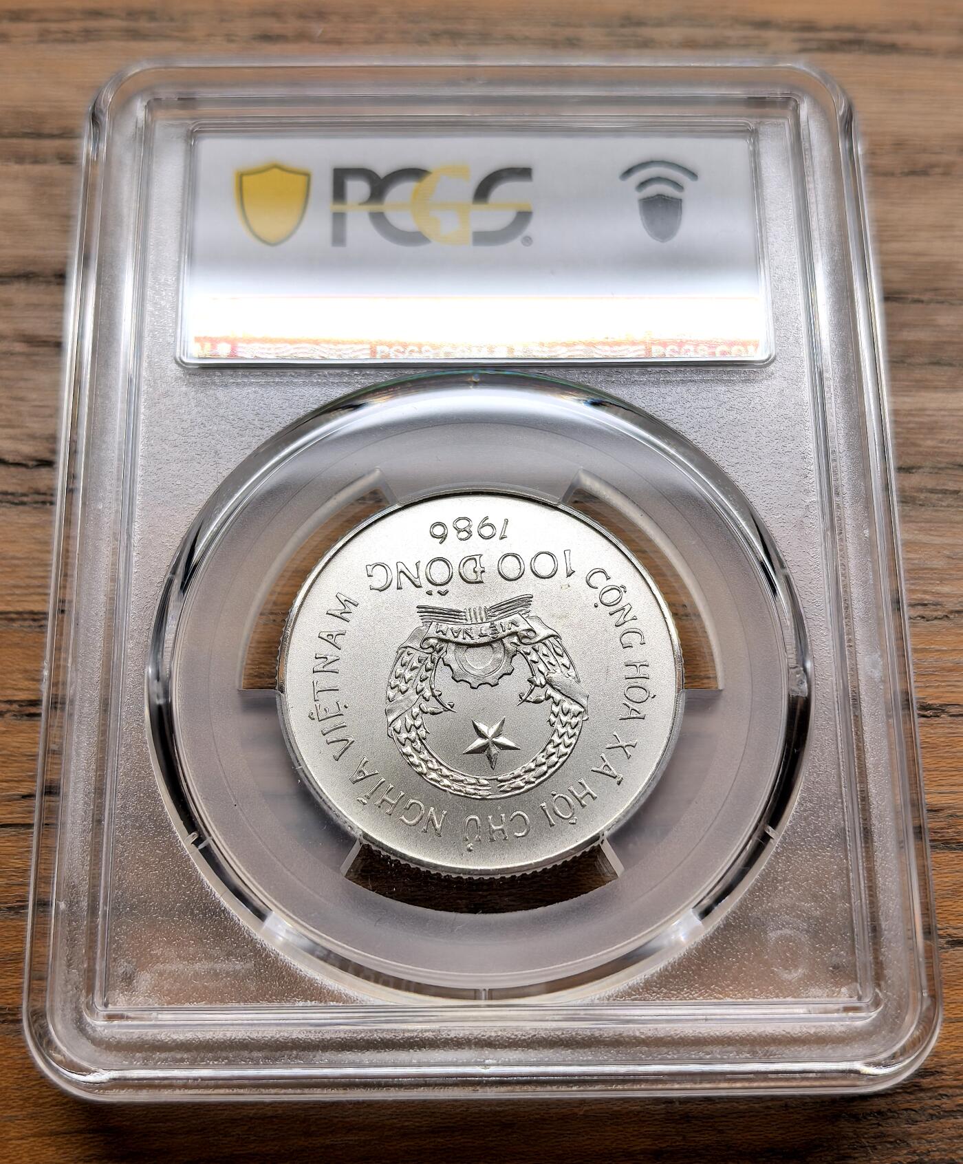 纫秋兰以为佩·凡希社微拍感恩专场 1986越南孔雀100D银币PCGS-MS67