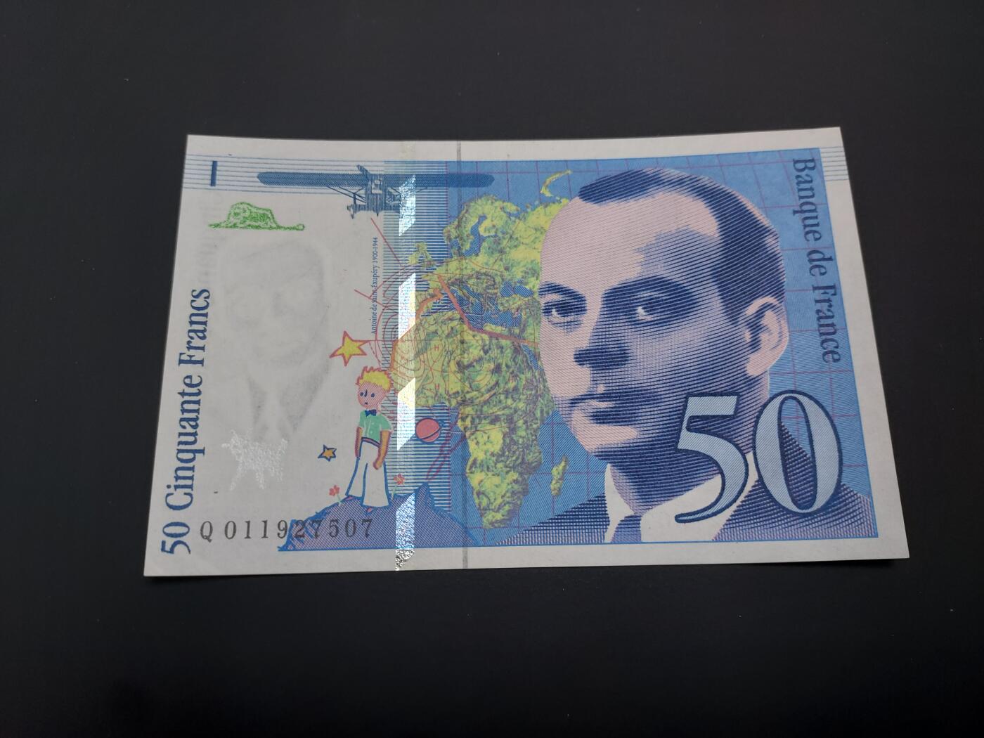 博彦收藏   12月8日 8点 钱币专场 法国 小王子50法郎 UNC 右下角有折印 95品