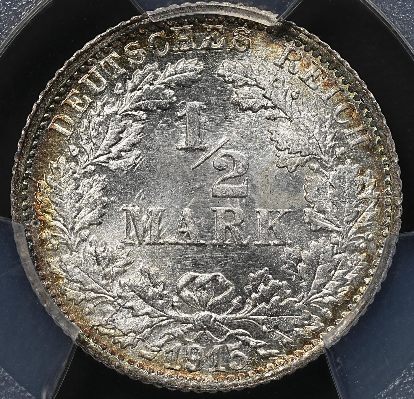 修遠堂世界钱币第九十五期 PCGS MS671915年德国1/2马克银币 F厂铭 环彩