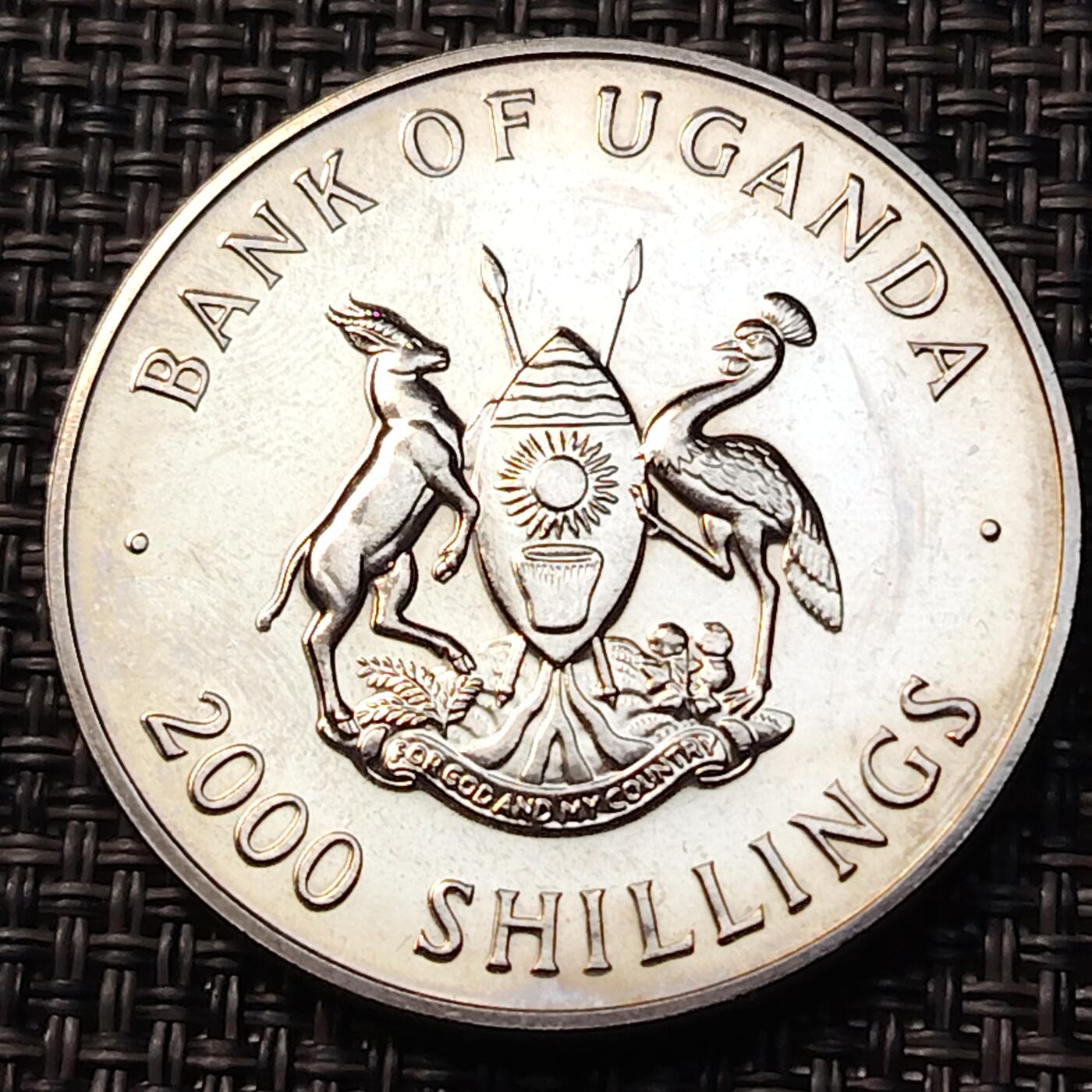 布加迪🐬～世界钱币(上海)🌾第 262 期 /  各国套币和散币 乌干达🇺🇬 1995年 5元 联合国成立50周年纪念币 升旗员