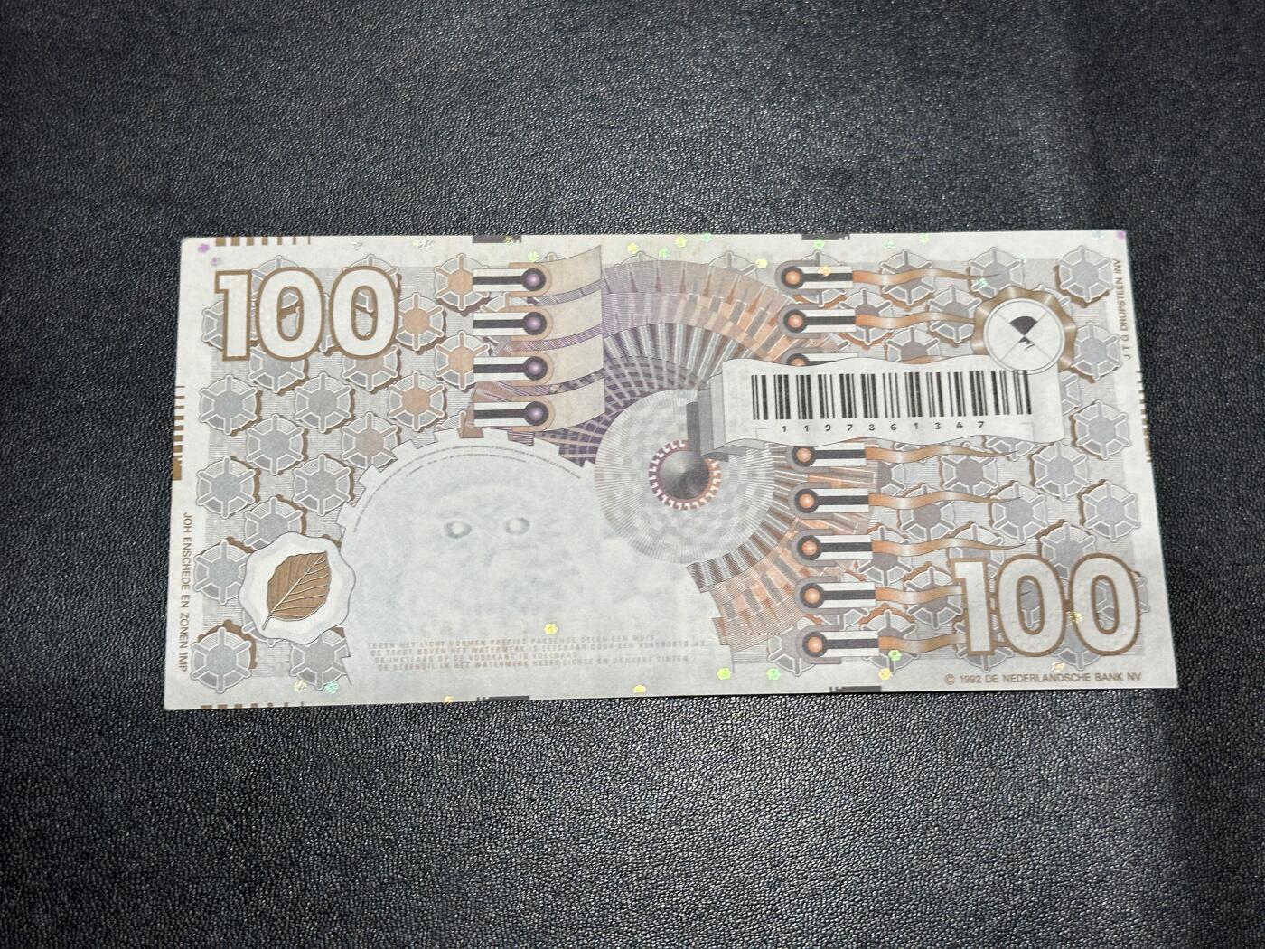 《外钞收藏家》第五百九十期（欧洲强钞、港币、硬通货及丰富裸币大拍场）（本平台长期征集拍品、欢迎藏友们联系合作） 1992年荷兰齿轮版100盾 AU品相