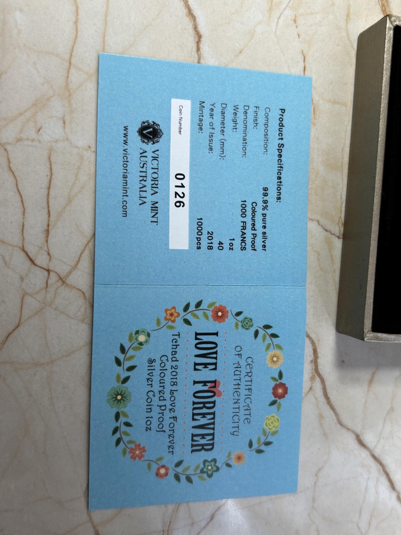 第184期拍卖 乍得2018年永恒的爱彩色1盎司纪念银币，999银，发行1000枚