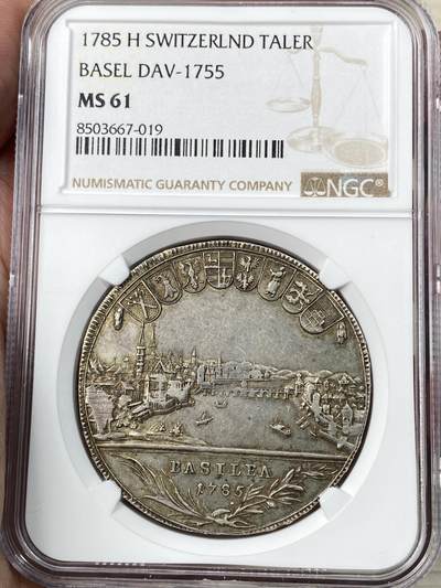 万国钱币拍卖第056期 - NGC MS61 1785瑞士巴塞尔城市景观大泰勒 大热门瑞士景观品种 正面巴塞尔老城的山川湖景一览无余 背面是巴塞尔著名的喷火怪兽巴西利斯克 原味老彩包浆