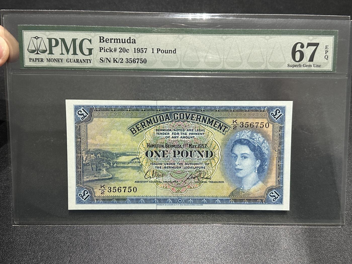 《外钞收藏家》第五百九十期（欧洲强钞、港币、硬通货及丰富裸币大拍场）（本平台长期征集拍品、欢迎藏友们联系合作） 1957年百慕大1镑 PMG67 稀少安全线版