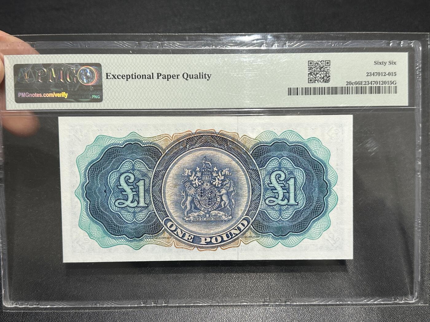 《外钞收藏家》第五百九十期（欧洲强钞、港币、硬通货及丰富裸币大拍场）（本平台长期征集拍品、欢迎藏友们联系合作） 1957年百慕大1镑 PMG66 BWC版 尾731