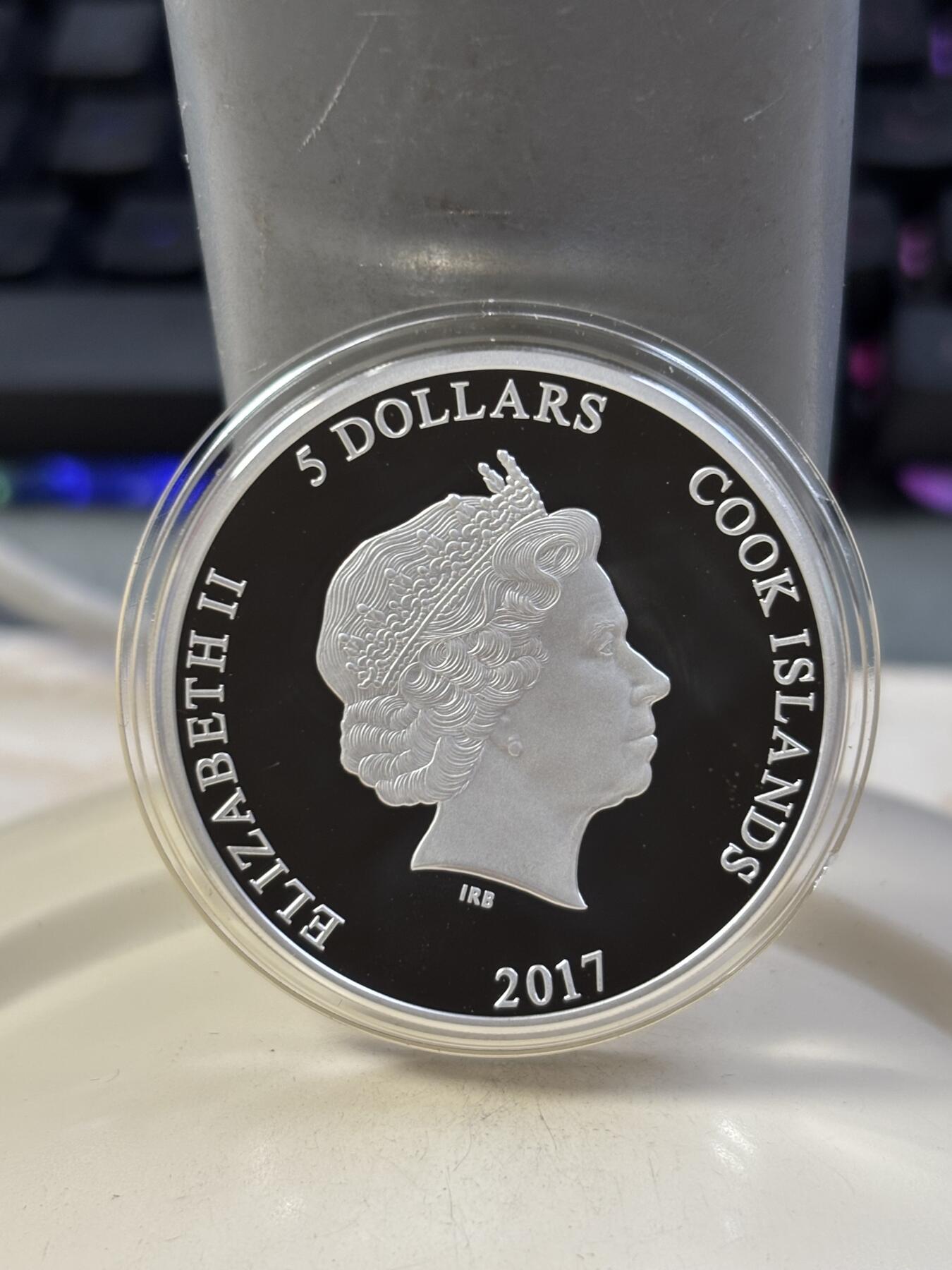 第184期拍卖 库克2017年哈利波特神奇野兽高浮雕纪念银币，1盎司，999银，