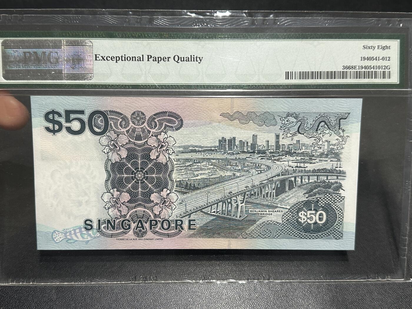 《外钞收藏家》第五百九十期（欧洲强钞、港币、硬通货及丰富裸币大拍场）（本平台长期征集拍品、欢迎藏友们联系合作） 1997年新加坡船版100元 PMG68 高分 靓号