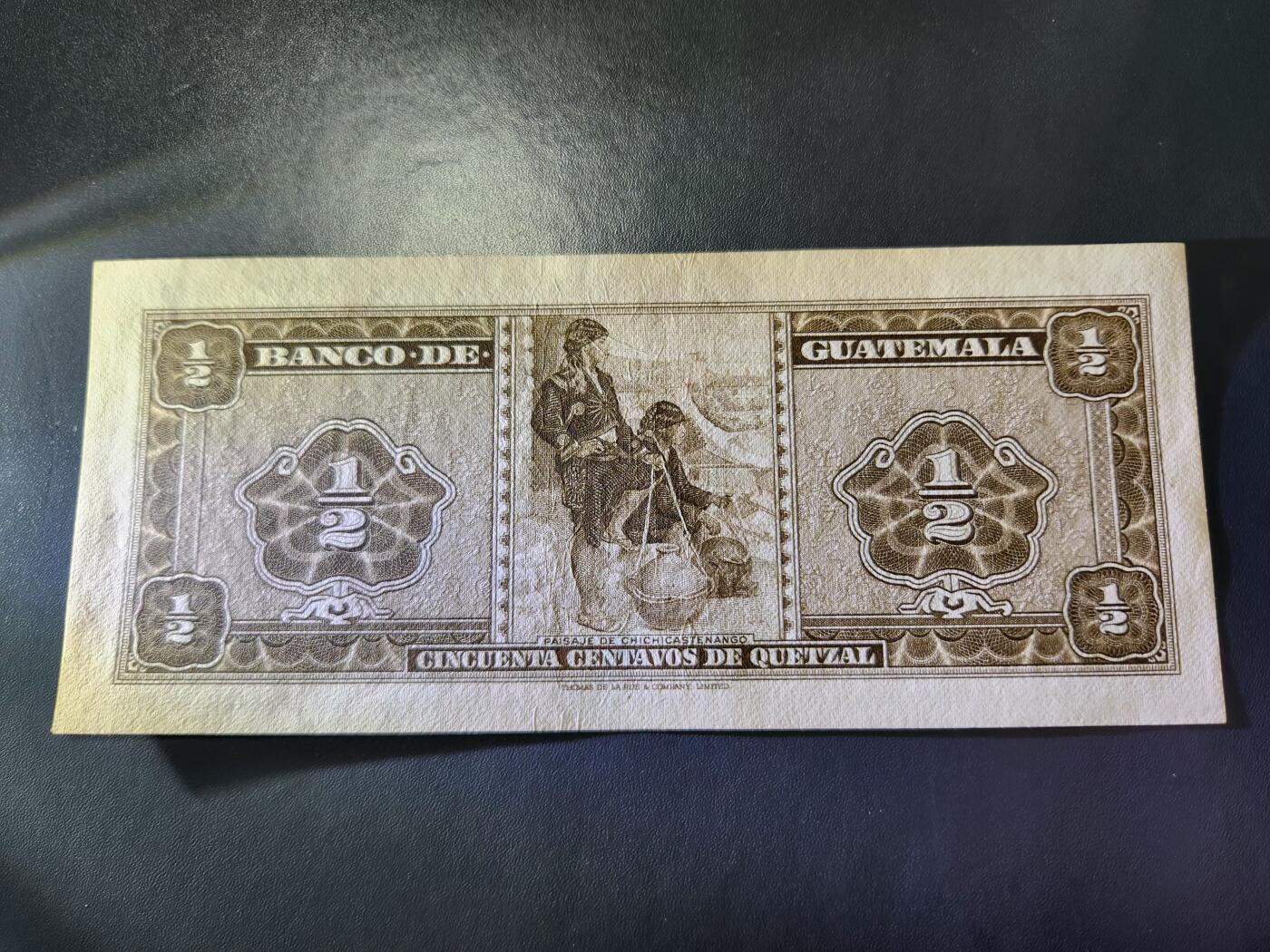 12月3号晚上8点 外国纸币自动截拍第67场 危地马拉1968年1/2 近新