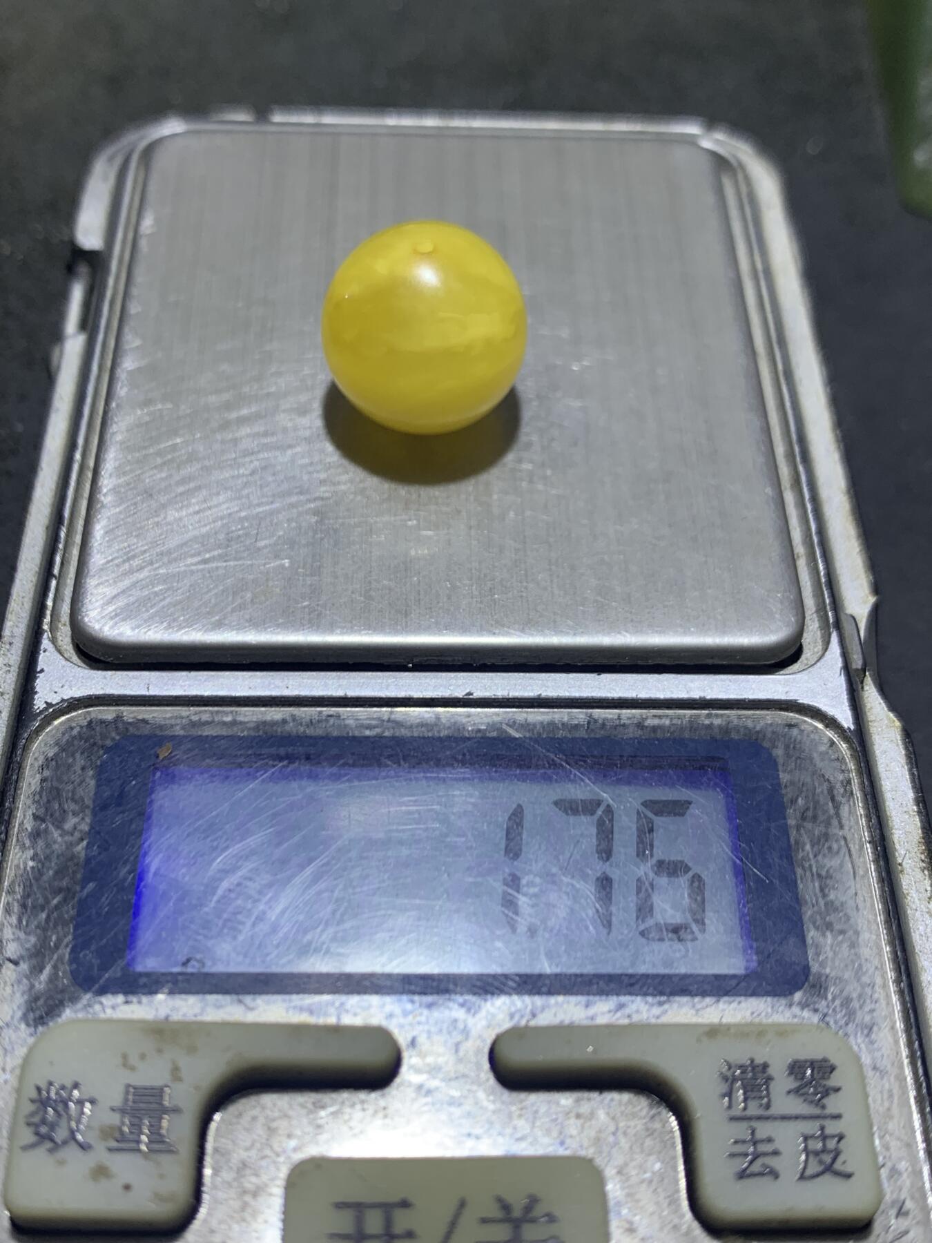 天然乌克兰原矿蜜蜡通货圆珠一颗，