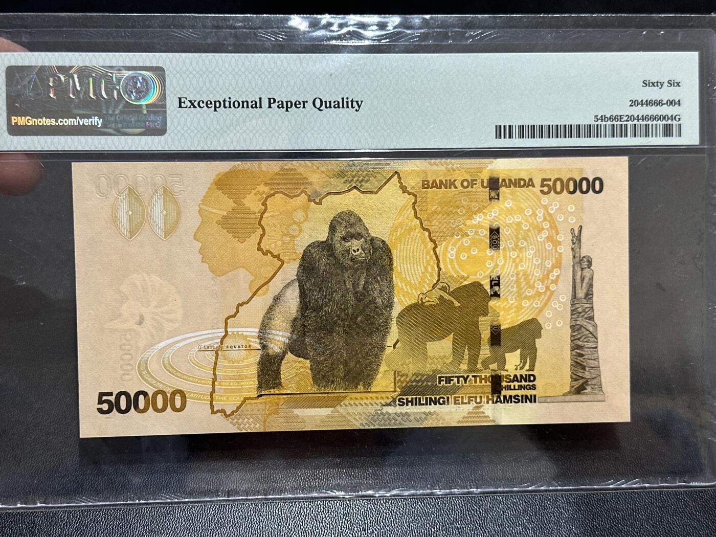 《外钞收藏家》第五百九十期（欧洲强钞、港币、硬通货及丰富裸币大拍场）（本平台长期征集拍品、欢迎藏友们联系合作） 2013年乌干达5000先令 PMG66 获奖钞 无47靓号