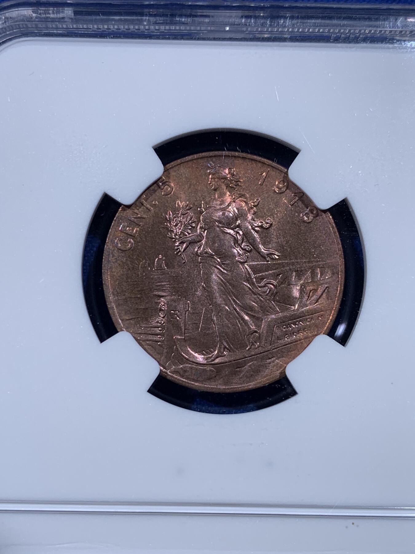 《竞宝斋》第443场 周日，周一，2场连拍 （全场包邮） NGC MS64BN 意大利1918年拿花女神5分铜币，意系经典，拿花系列铜币最大面值。女神面光度极好，五彩铜光靓丽，64收藏级高分。拿花真的漂亮 艺术性无以伦比