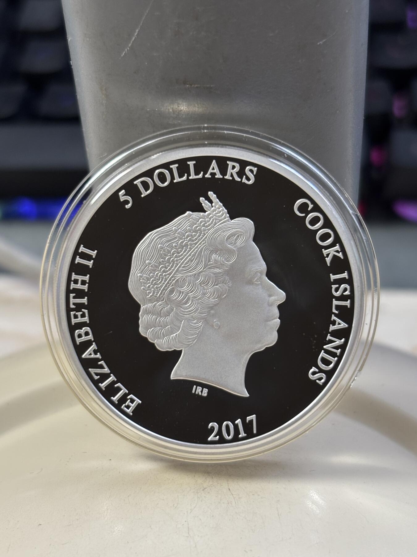 第184期拍卖 库克2017年哈利波特神奇野兽高浮雕纪念银币，1盎司，999银，