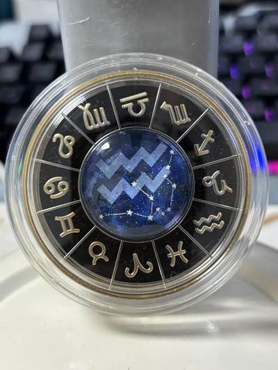 第184期拍卖 - 喀麦隆2023年十二星座系列水瓶座镀金彩色纪念银币，999银，发行500枚，17.5克