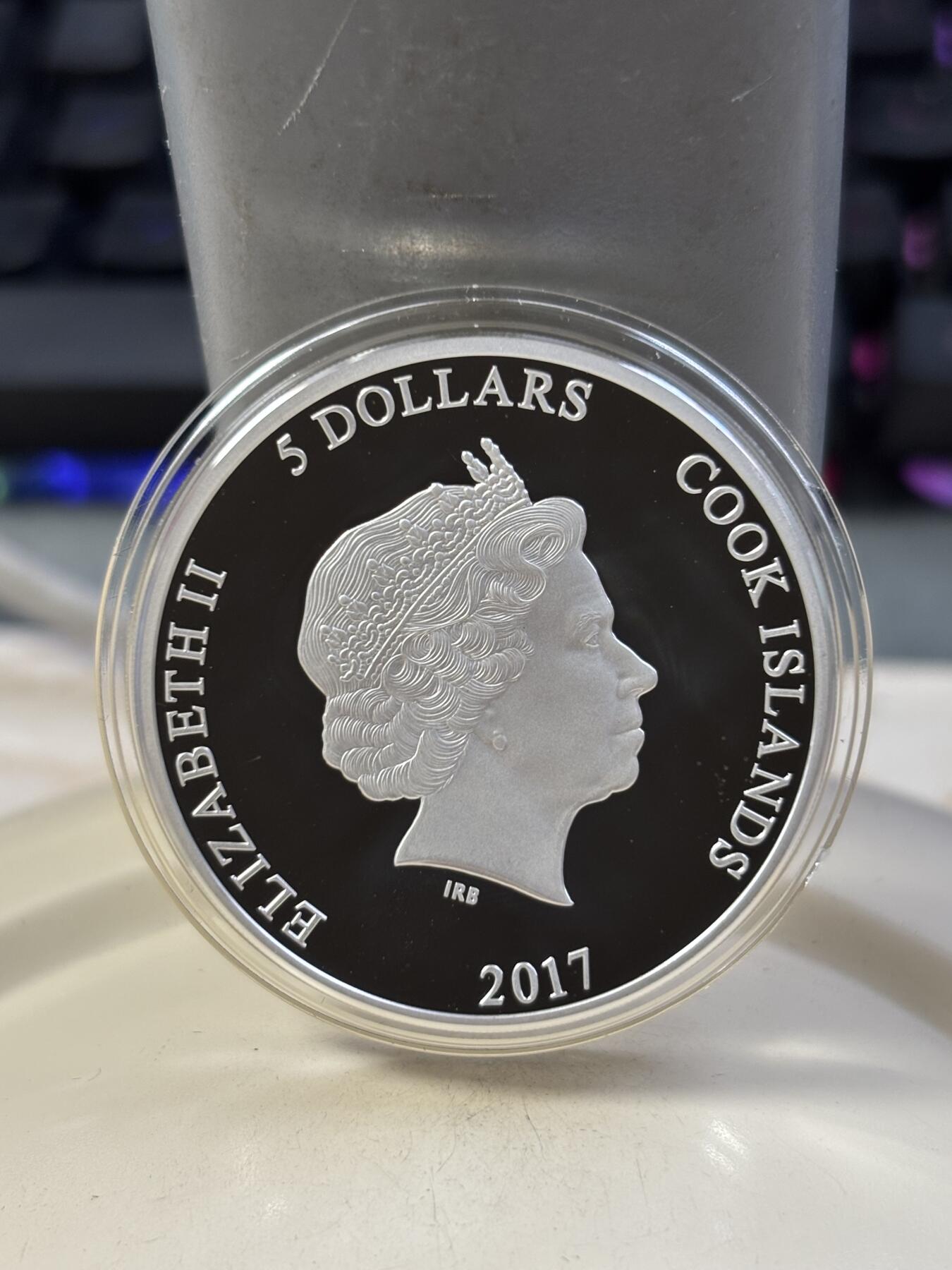 第184期拍卖 库克2017年哈利波特神奇野兽高浮雕纪念银币，1盎司，999银，