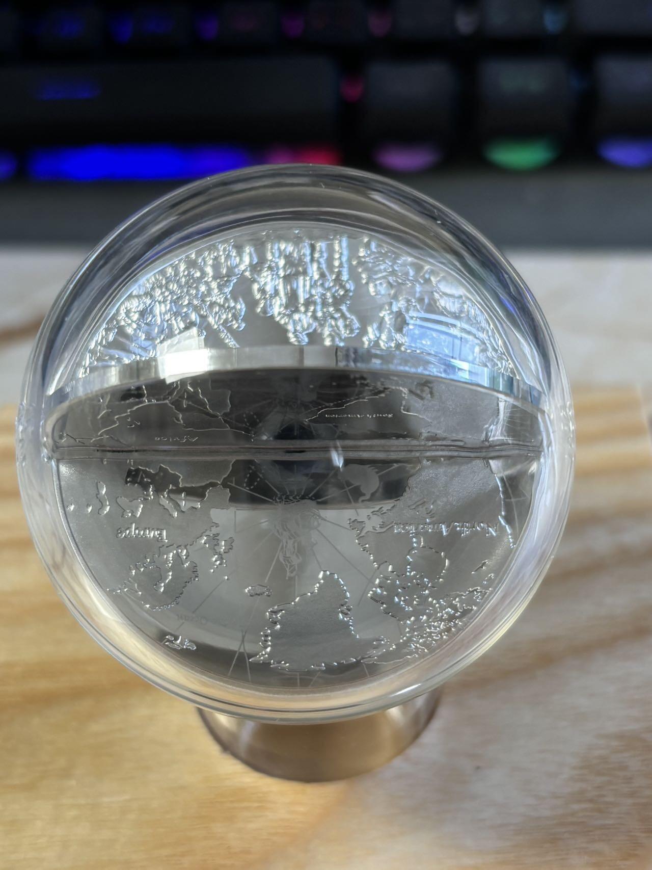 第183期拍卖 纽埃2021年麦哲伦环球航行立体镶嵌2盎司纪念银币，999银，发行333枚，亚克力盒有裂痕