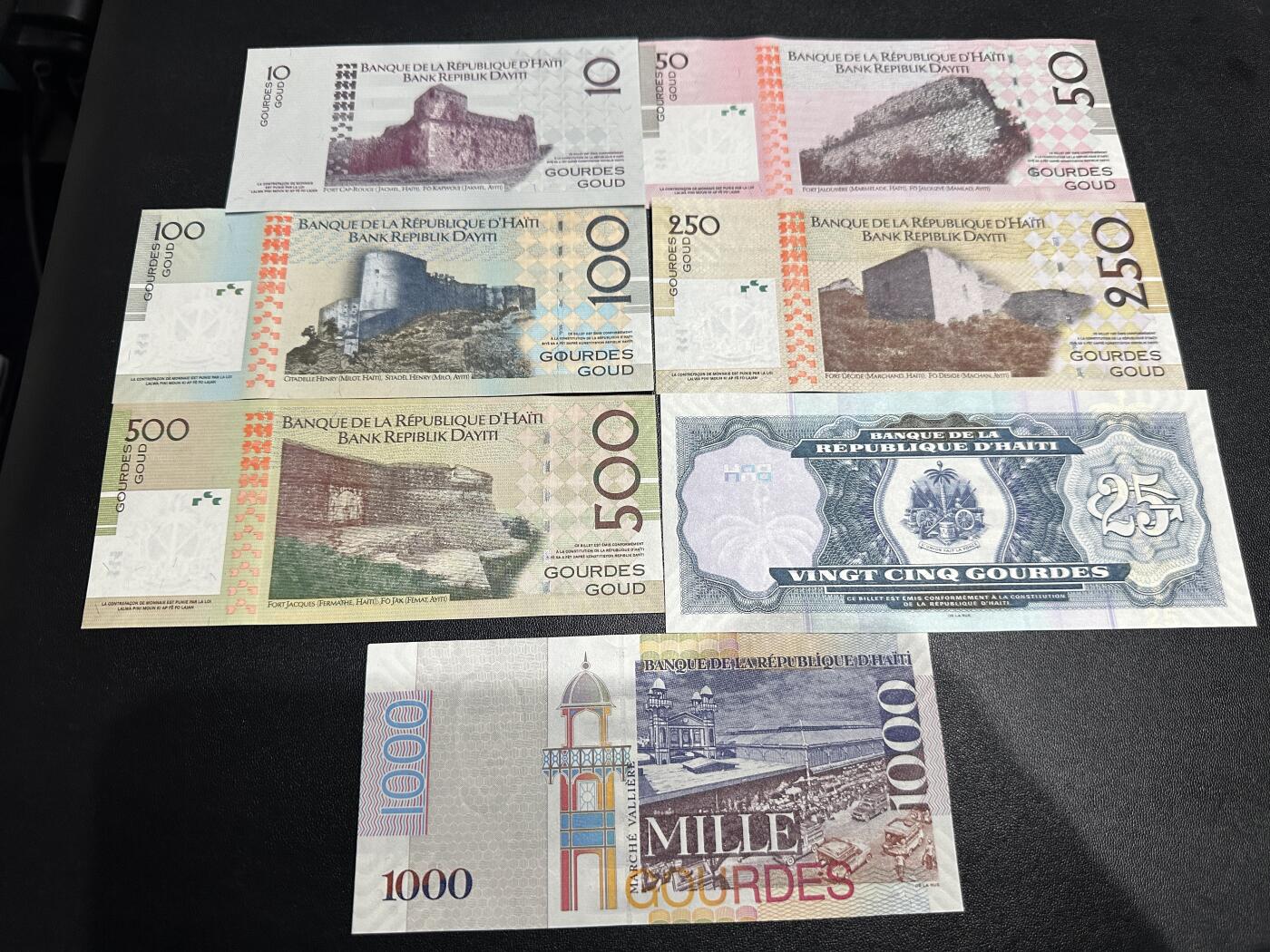 《外钞收藏家》第五百九十期（欧洲强钞、港币、硬通货及丰富裸币大拍场）（本平台长期征集拍品、欢迎藏友们联系合作） 海地10-1000面额 7张一起 全新UNC 尾8803