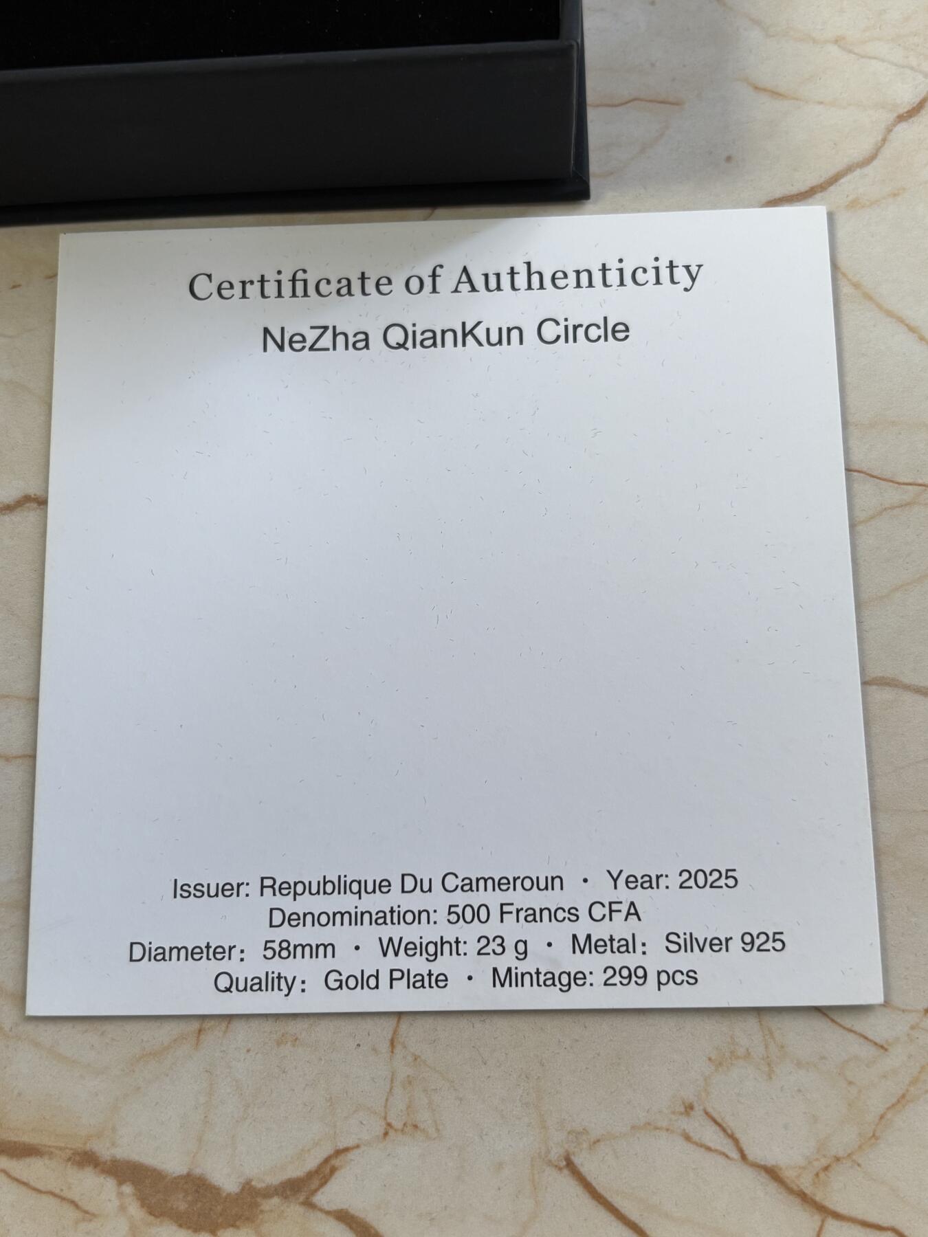 第184期拍卖 喀麦隆2025年哪吒乾坤圈火系镶嵌水晶镀金纪念银币,925银镀金，23克，发行299枚，